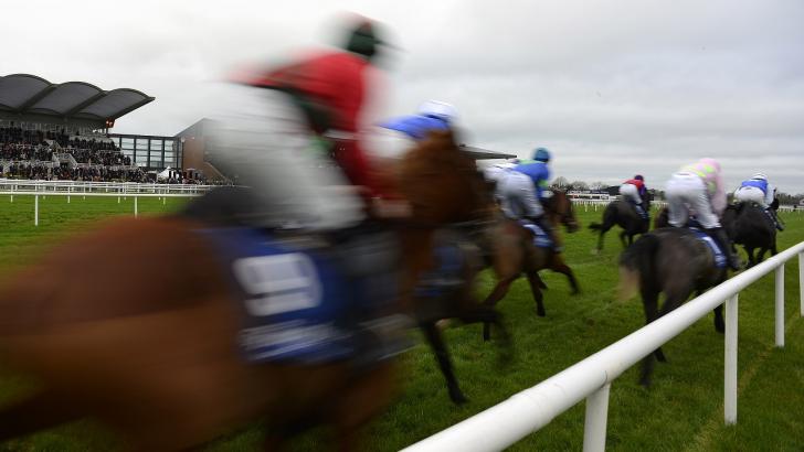 Horses pass the stands at Fairyhouse